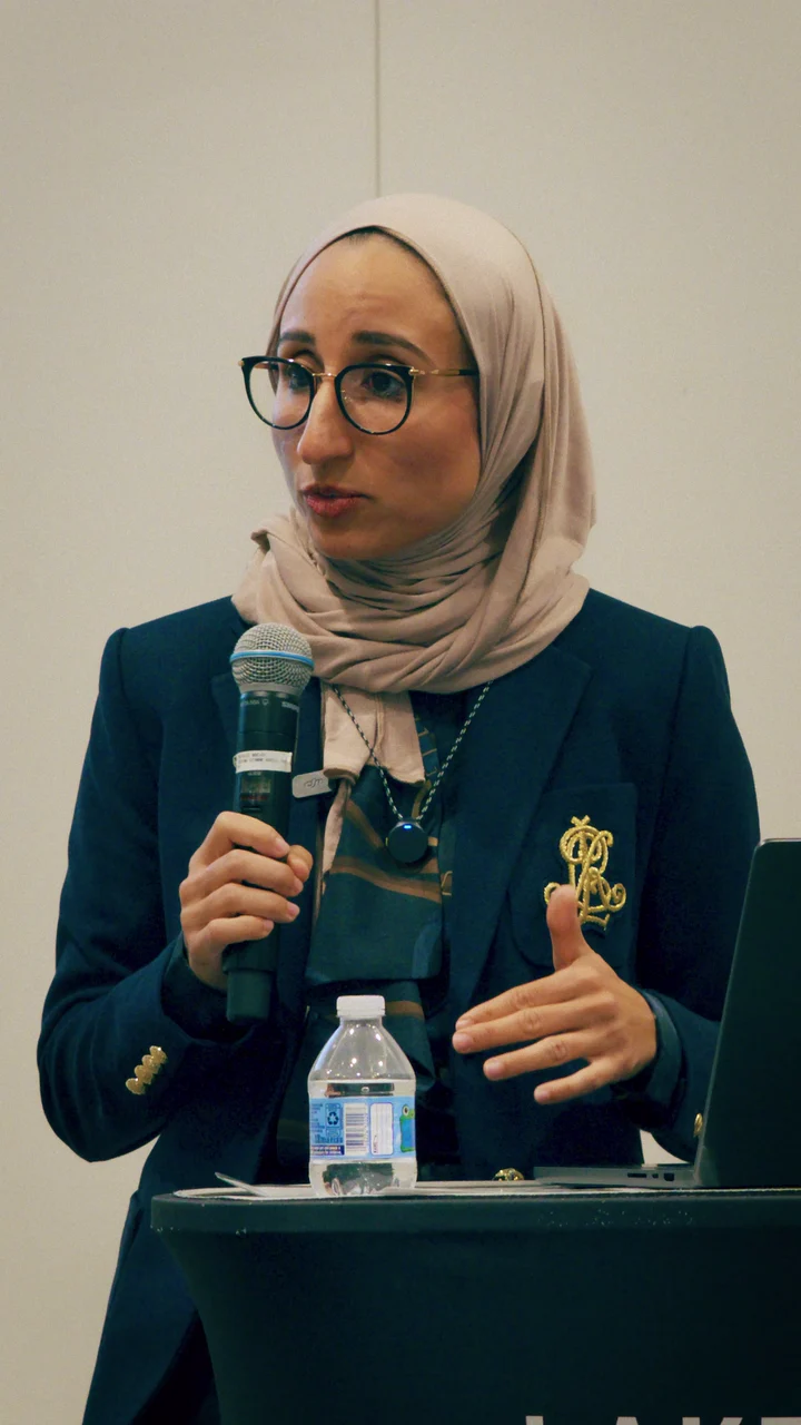 Dr. Jumana Al-Deek speaking at a women's wellness event: Understanding Hormone Therapy: Estrogen, Progesterone & Testosterone