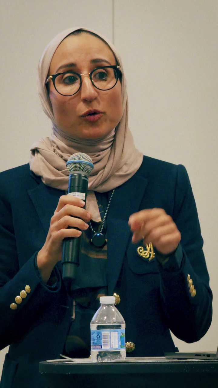 Dr. Jumana Al-Deek speaking at a women's wellness event: Menopause Care: Why Counseling Matters