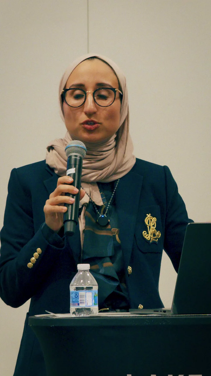 Dr. Jumana Al-Deek speaking at a women's wellness event: Speaking on Menopause and Weight Changes
