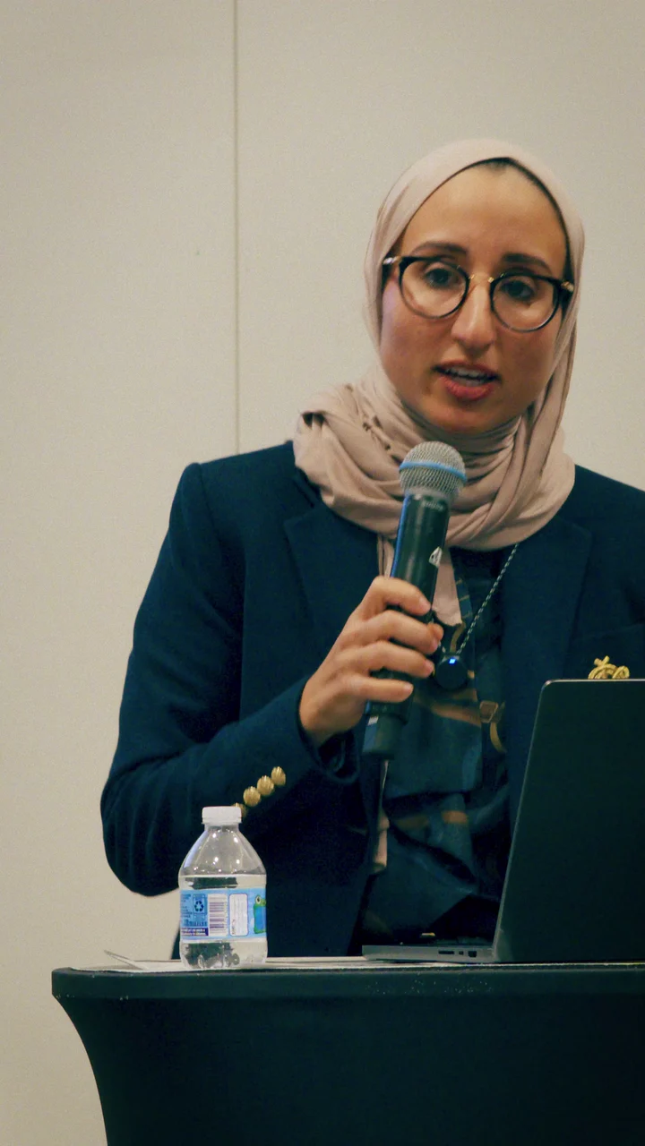 Dr. Jumana Al-Deek speaking at a women's wellness event: Recognizing Perimenopause and Menopause Symptoms